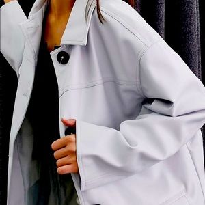 Oversized faux leather jacket in light blue